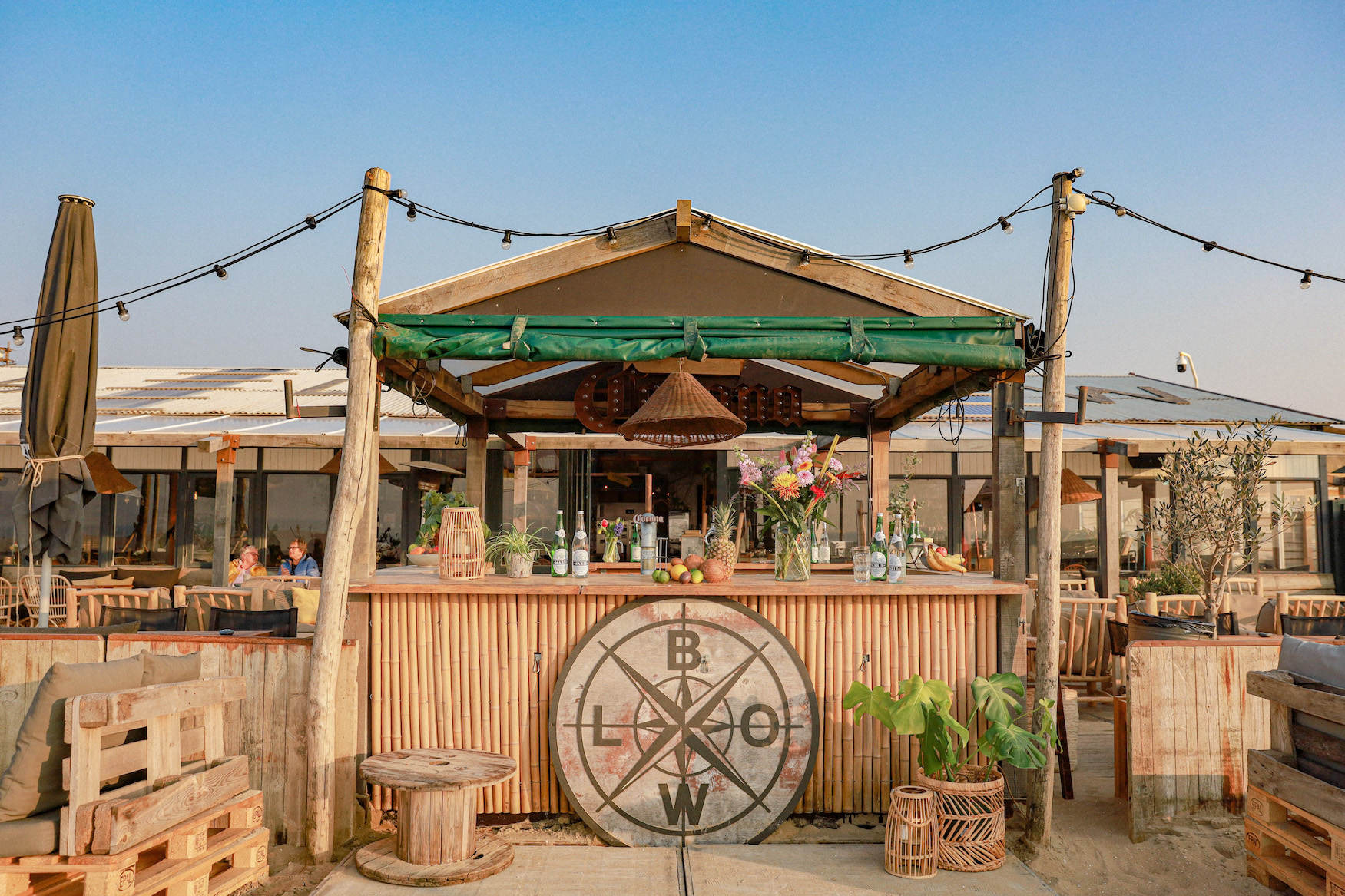 Cropped photo of the exterior of the top floor of an old stone building.